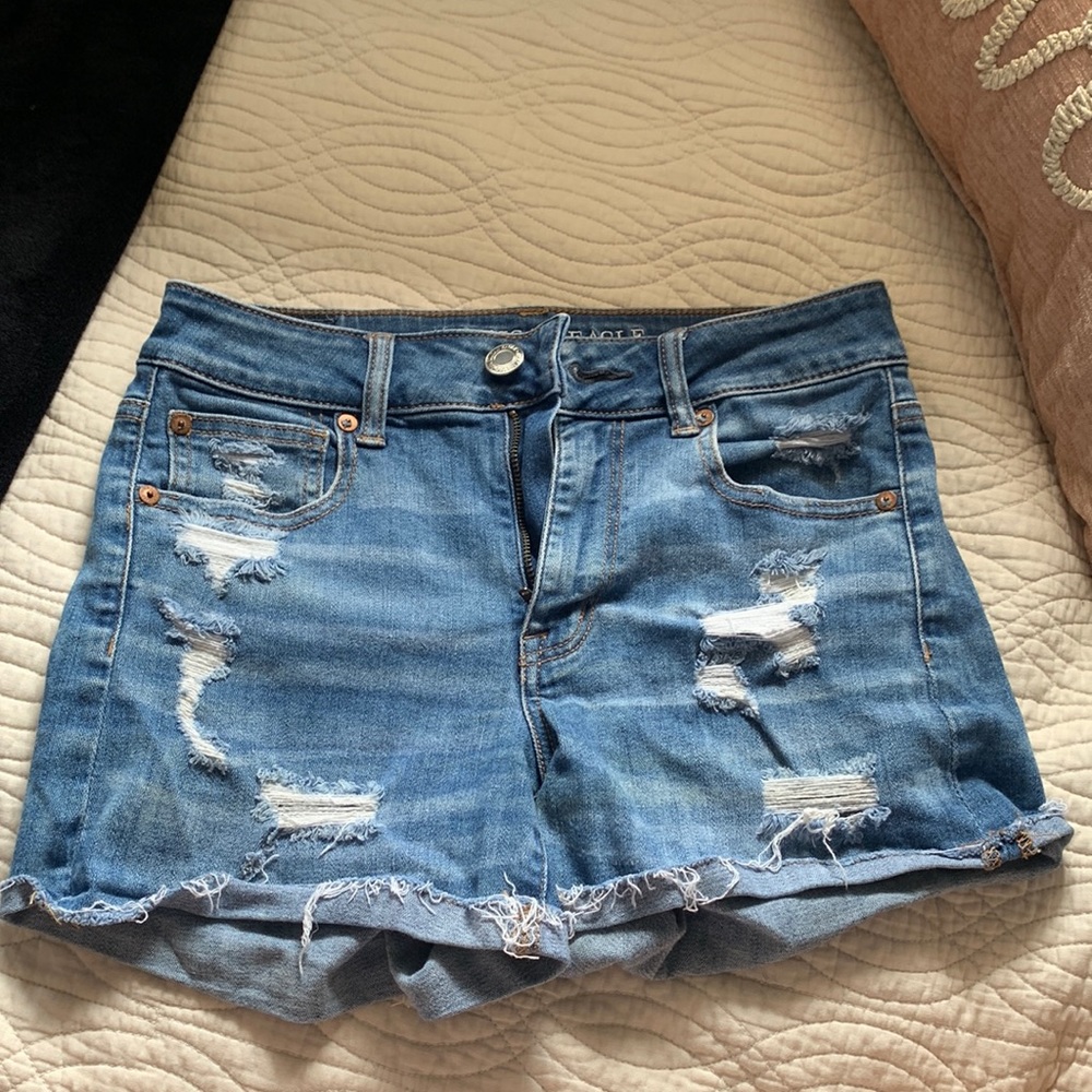 Medium wash ripped high waisted shorts from American eagle